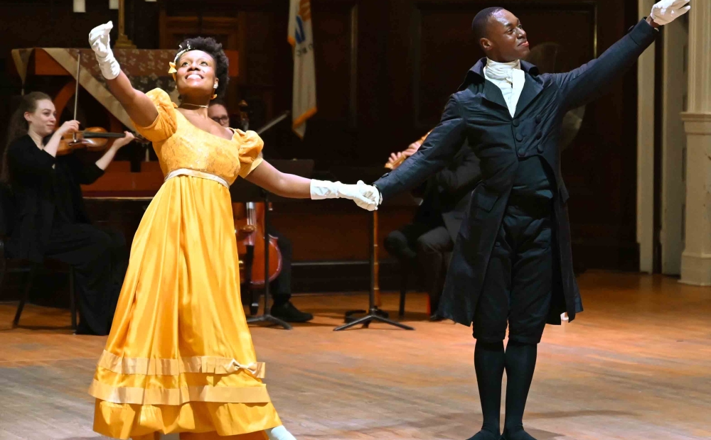Image of dancers posing for bows at the end of the performance. 